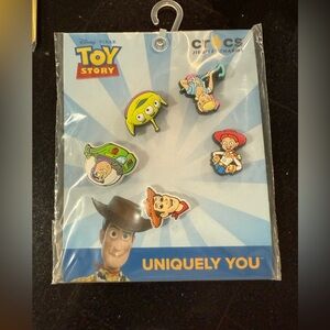 CROCS Toy Story Character Pin Set - Green, Red, Blue, Yellow